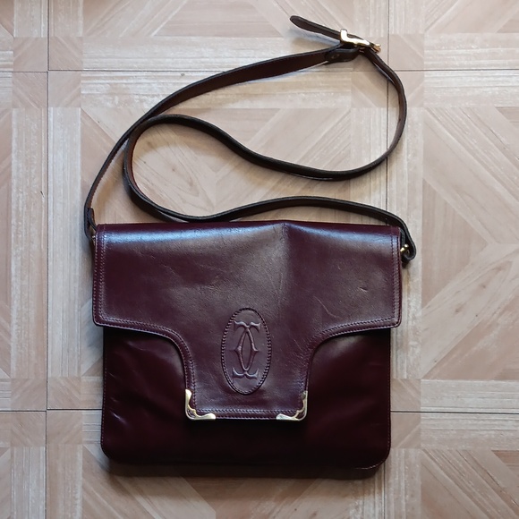 Vintage Cartier burgundy leather cross body bag